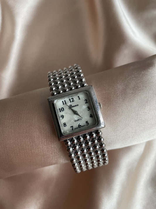 silver bracelet watch-shell dial