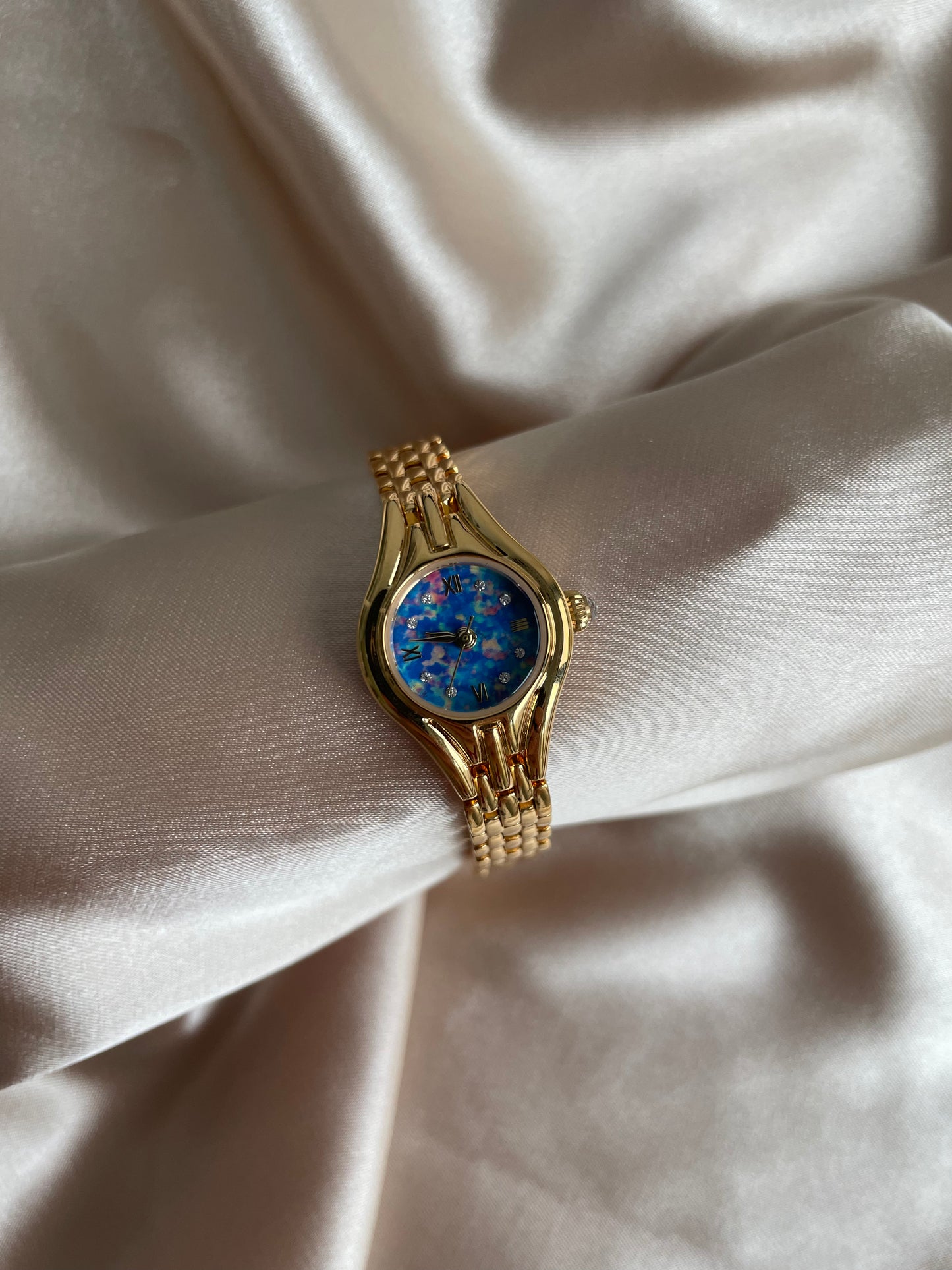 Vintage gold watch with blue shell dial