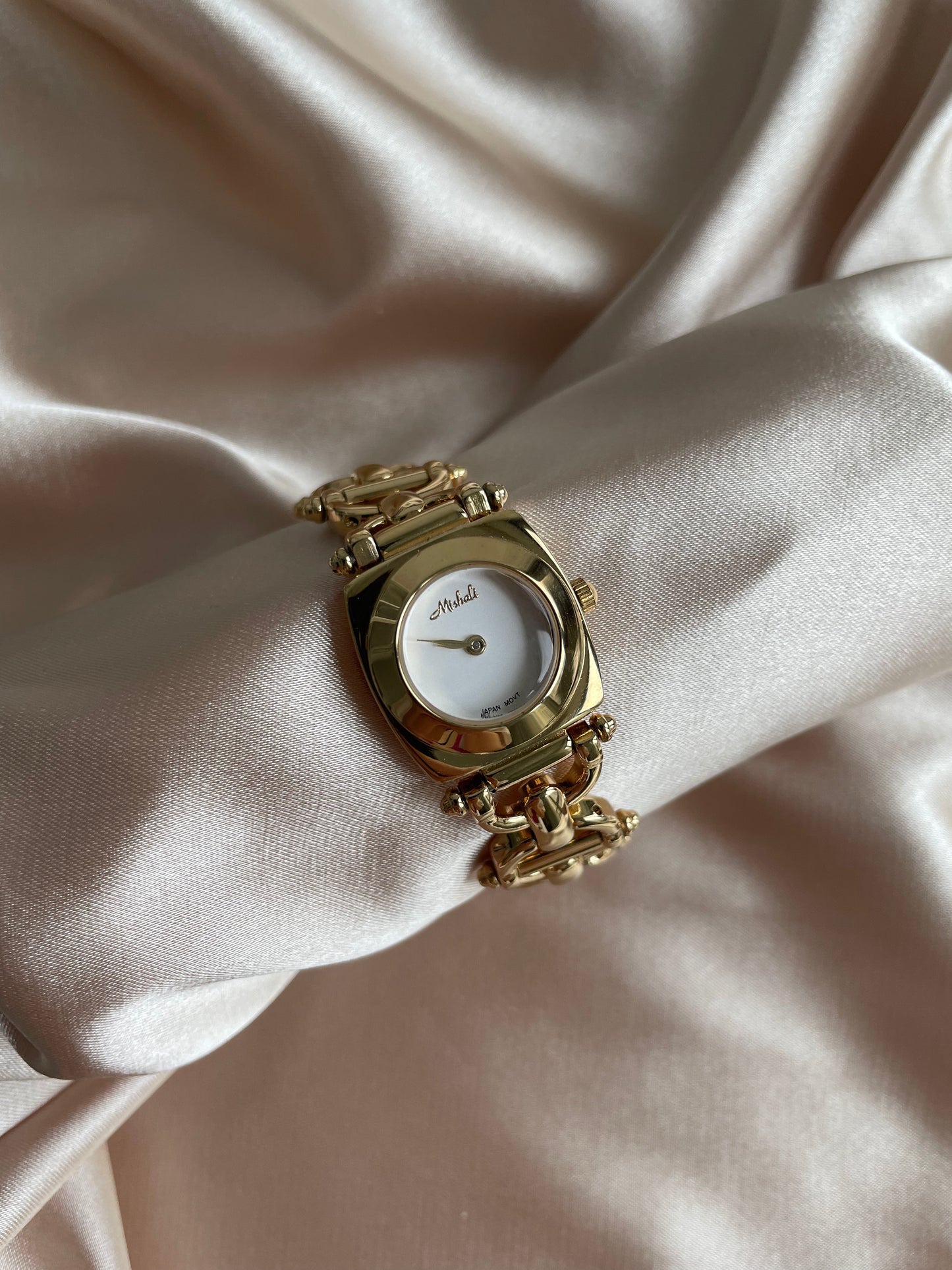 vintage gold watch white dial