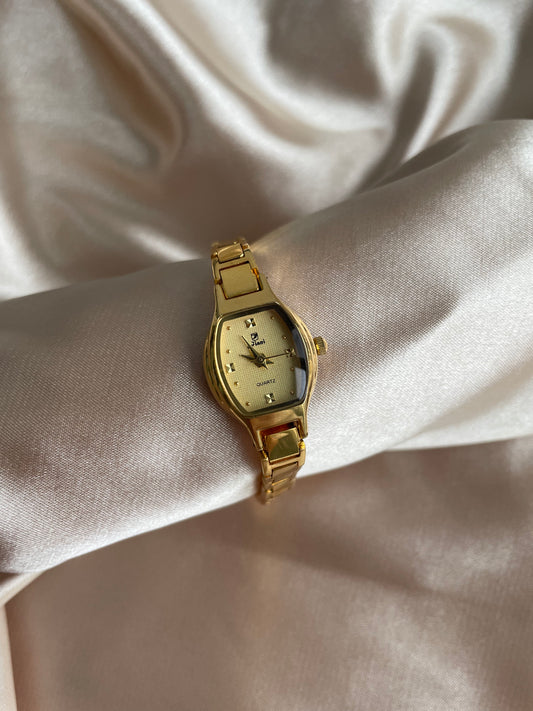 Vintage gold watch barrel shape dial