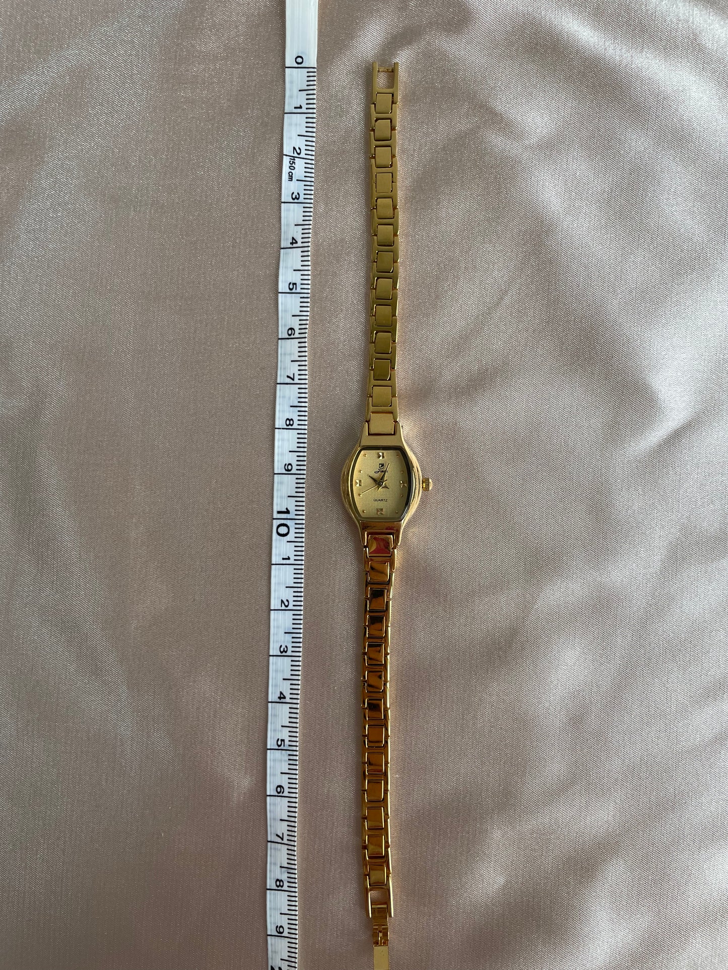 Vintage gold watch barrel shape dial