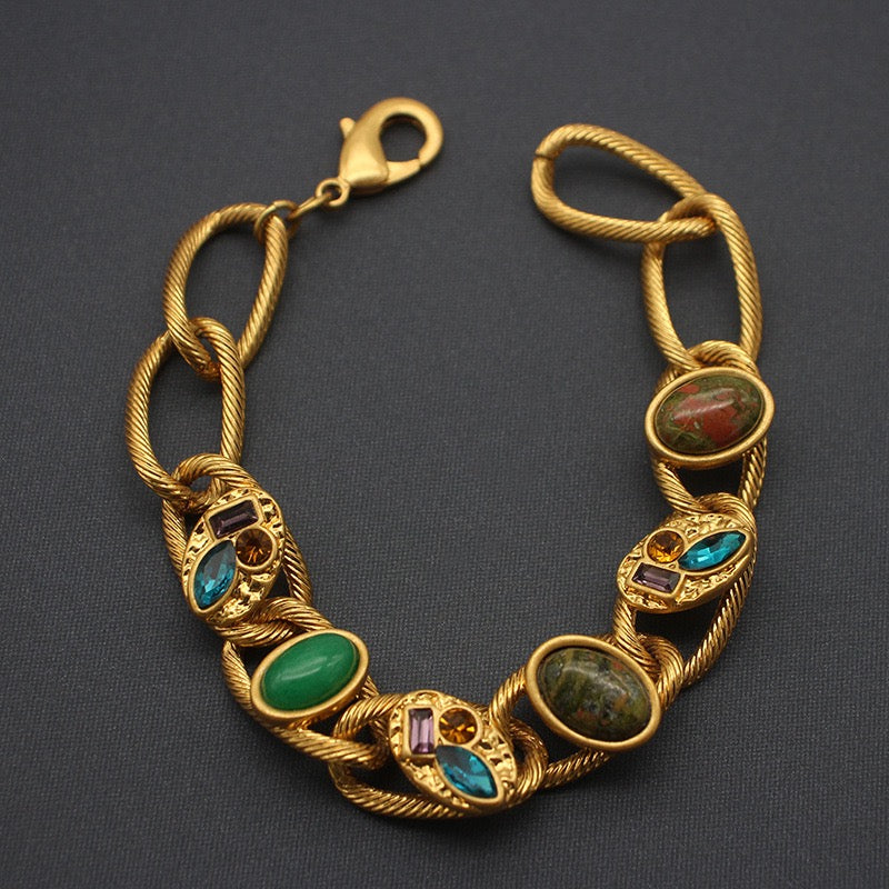 Vintage gold bracelet with gemstones